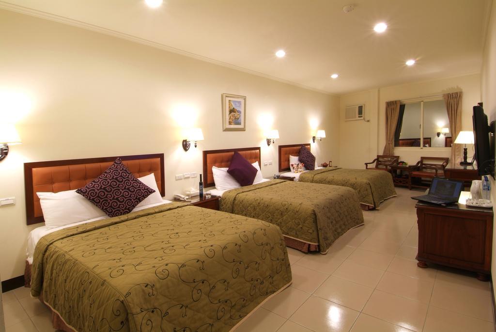 Puti Commercial Hotel Longtan Luaran gambar