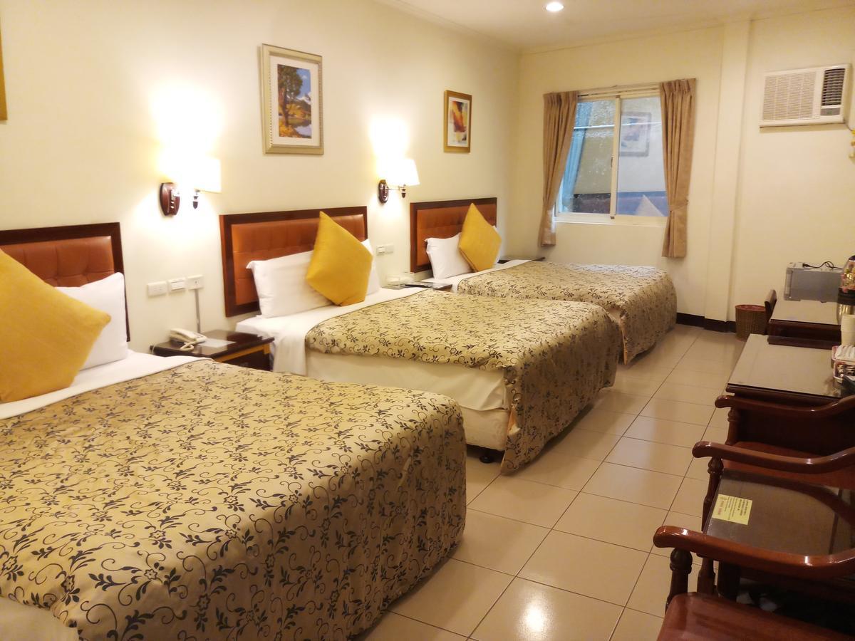 Puti Commercial Hotel Longtan Luaran gambar