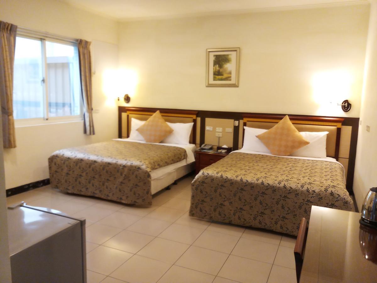Puti Commercial Hotel Longtan Luaran gambar