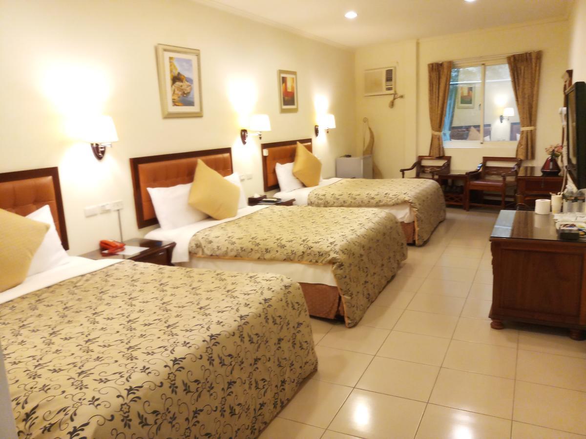 Puti Commercial Hotel Longtan Luaran gambar